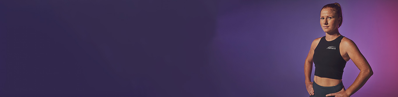 NASM Trainer with purple background
