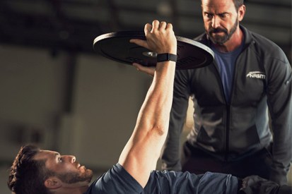 A Male Coach Training a Male Client