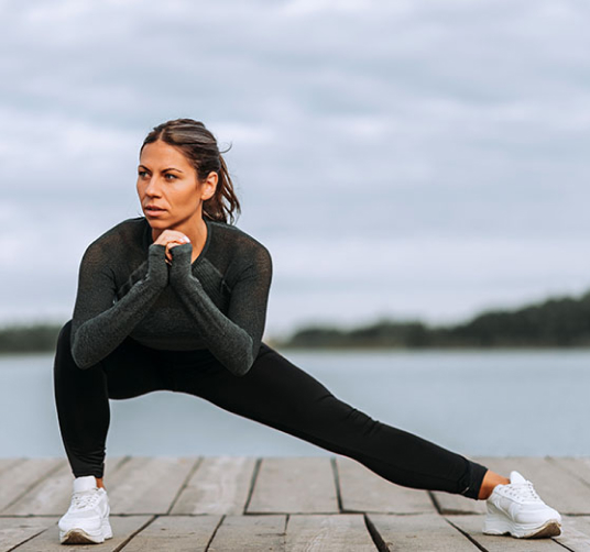 Woman doing leg stretch